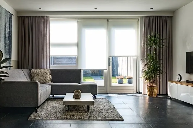 A living room with a couch and coffee table